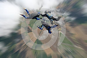 Skydivers in freefall photo