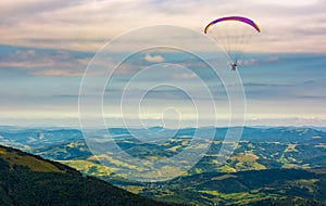 Skydiving extreme over the rural valley