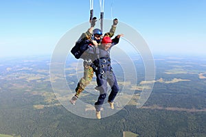 Skydiving. The moment of parachute deployment.