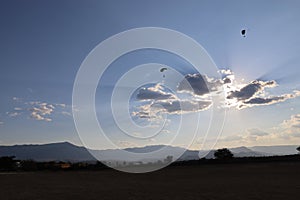 Skydiving. A parachute is landing.