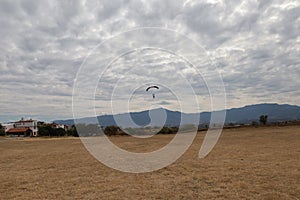 Skydiving. A parachute is landing.