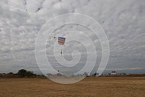 Skydiving. A parachute is landing.