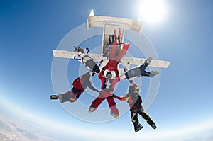Skydiving people jump from the plane