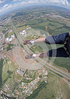 Skydiving point of view of my shoes untied