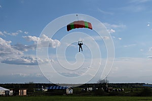 Skydiving. Skydiver is going to land.