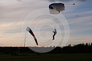 Skydiving. Skydiver is going to land.