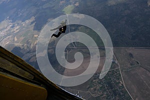 Skydiving. Skydiver has just jumped out of a plane.