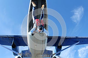 Skydiving. Solo jump. A girl is in the sky.