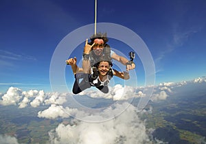 Skydiving tandem couple happy photo