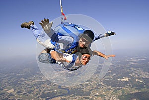 Skydiving tandem father and son