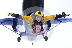 Skydiving. Tandem has just jumped out.