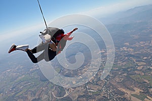 Skydiving. Tandem jump. The falling in the sky.