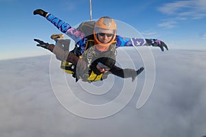 Skydiving. Tandem jump. Flight in the sky.