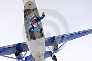 Skydiving. Tandem jump. Man and woman.