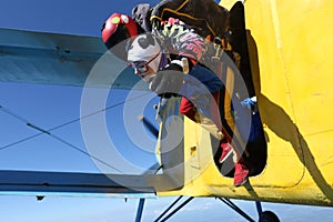 Skydiving. Tandem jump. Two people are in the sky.