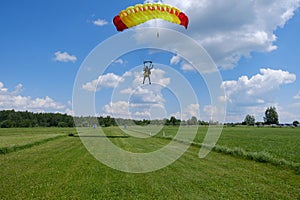 Skydiving. Tandem jump. Two skydivers are in the sky.