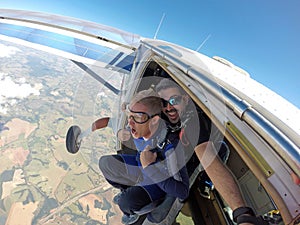 Skydiving tandem middle-aged man