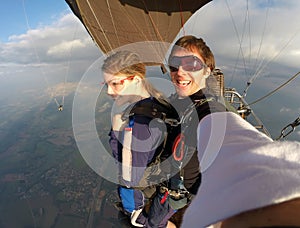 Skydiving tandem selfie pretty woman