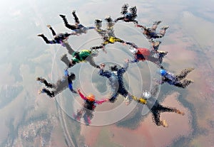 Skydiving team group formation illustration blurred effect