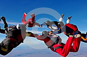 Skydiving team work formation make a circle