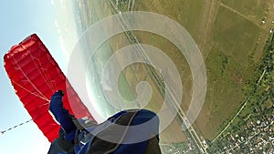 Skydiving video. Skydiver piloting a parachute.