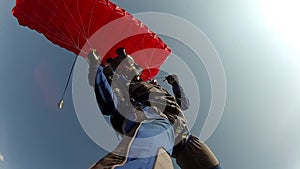 Skydiving video. Skydiver piloting a parachute.