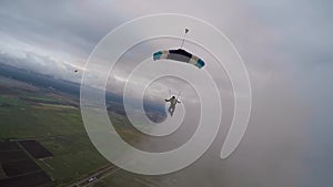 Skydiving video. Skydiver pilots its parachute.