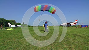 Skydiving video. Skydiver pilots its parachute.