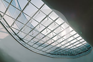 Skylight or glass sunroof ceiling of a building. Modern design architecture, or energy conservation model using nature sunlight