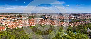 Skyline aerial view of Prague old town, Charles bridge, Prague Castle and St Vitus Cathedral and red roofs. Prague, Czech republic