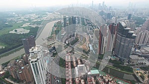 A skyline aerial view of Shenzhen, Lo Wu, China under smokey weather in the evening