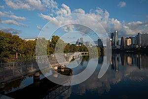 skyline of Austin with reflection in river in early morning