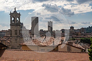 Skyline of Bergamo old town viewed from the citadel with medieval towers in Lombardy, Italy