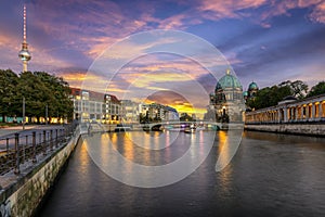 The skyline of Berlin during sunset time photo