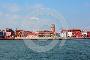 Skyline of Burano Island in Italy and the old aqueduct tower