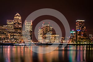 The skyline of Canary Wharf at night in London, England
