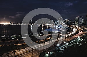 Skyline of capital city Luanda and its seaside during the night, Angola, Africa