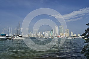 Skyline of Cartagena at the harbour, showing skyscrapers and yachts.