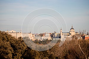 Skyline of Casa de Campo Lake in Madrid, Spain. Almudena Cathedral and the Royal Palace