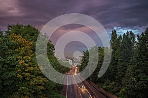 Skyline of central London with storm clouds from Holloway Bridge, UK photo