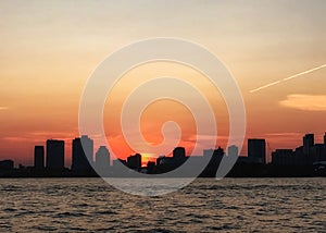 Skyline of Chicago at sunset as seen from boat on Lake Michigan
