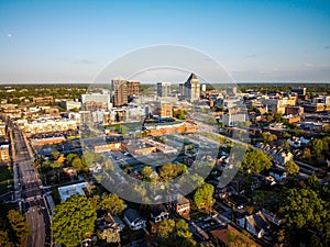 Skyline of the city of Greensboro under a blue sky in North Carolina photo