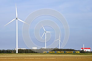 Skyline of Coevorden, windmills, train, factory