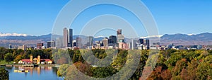 Skyline of Denver downtown with Rocky Mountains photo
