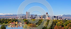 Skyline of Denver downtown with Rocky Mountains photo