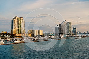 Skyline district of miami, usa on sea shore. Skyscraper buildings on cloudy sky. Architecture, structure, design