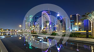 The skyline of Doha by night with starry sky seen from Park timelapse hyperlapse, Qatar