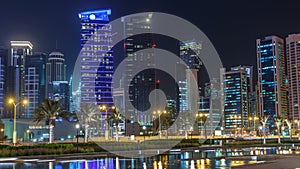 The skyline of Doha by night with starry sky seen from Park timelapse, Qatar