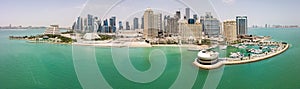 The skyline of Doha, Qatar, Persian Gulf, Middle East. Modern rich middle eastern city of skyscrapers, aerial view. photo