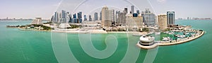 The skyline of Doha, Qatar, Persian Gulf, Middle East. Modern rich middle eastern city of skyscrapers, aerial view.